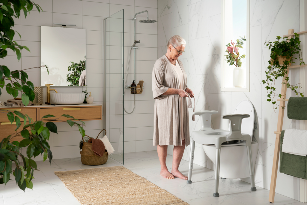Etac Swift -jalallinen wc-korotus käsituilla