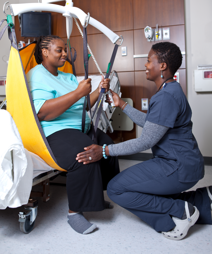 Guldmann Basic High Bariatric -nostoliina - hoitaja