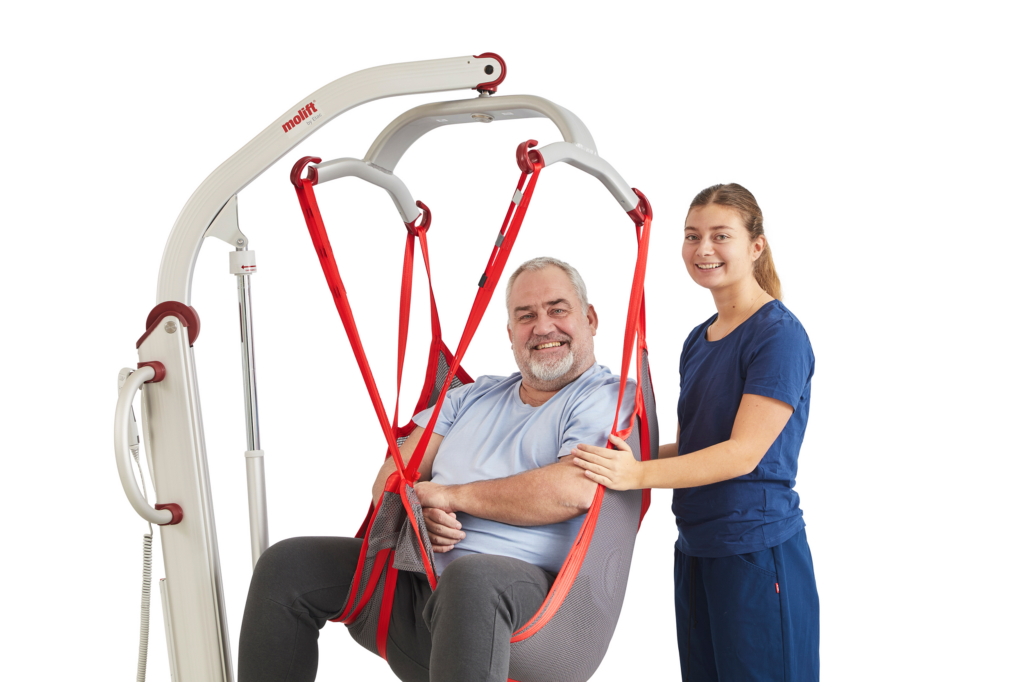 Molift Mover 300 -henkilönostolaite - Molift RgoSling MediumBack Padded -nostoliina - hoitaja ja potilas